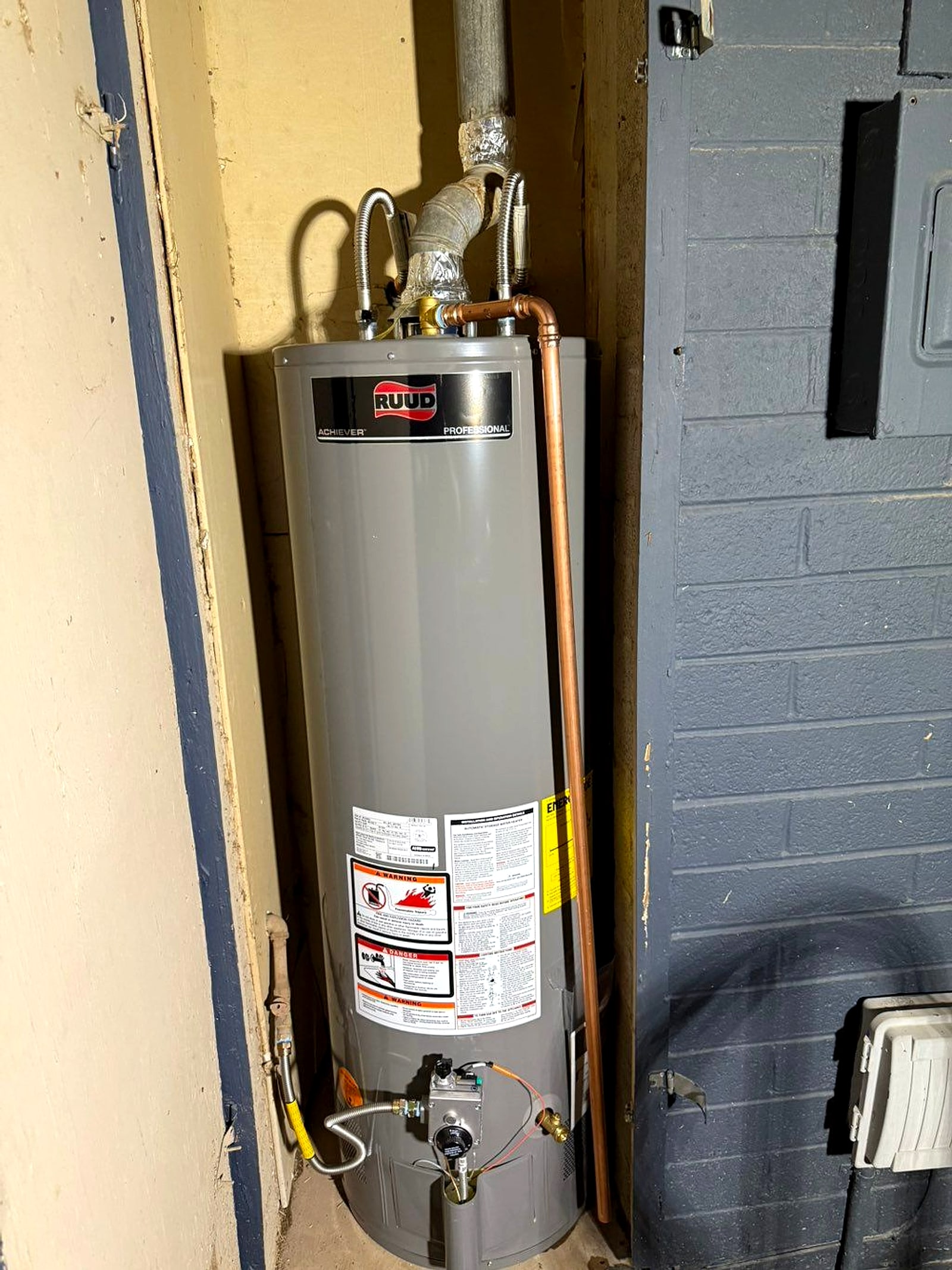 New water heater in an exterior closet