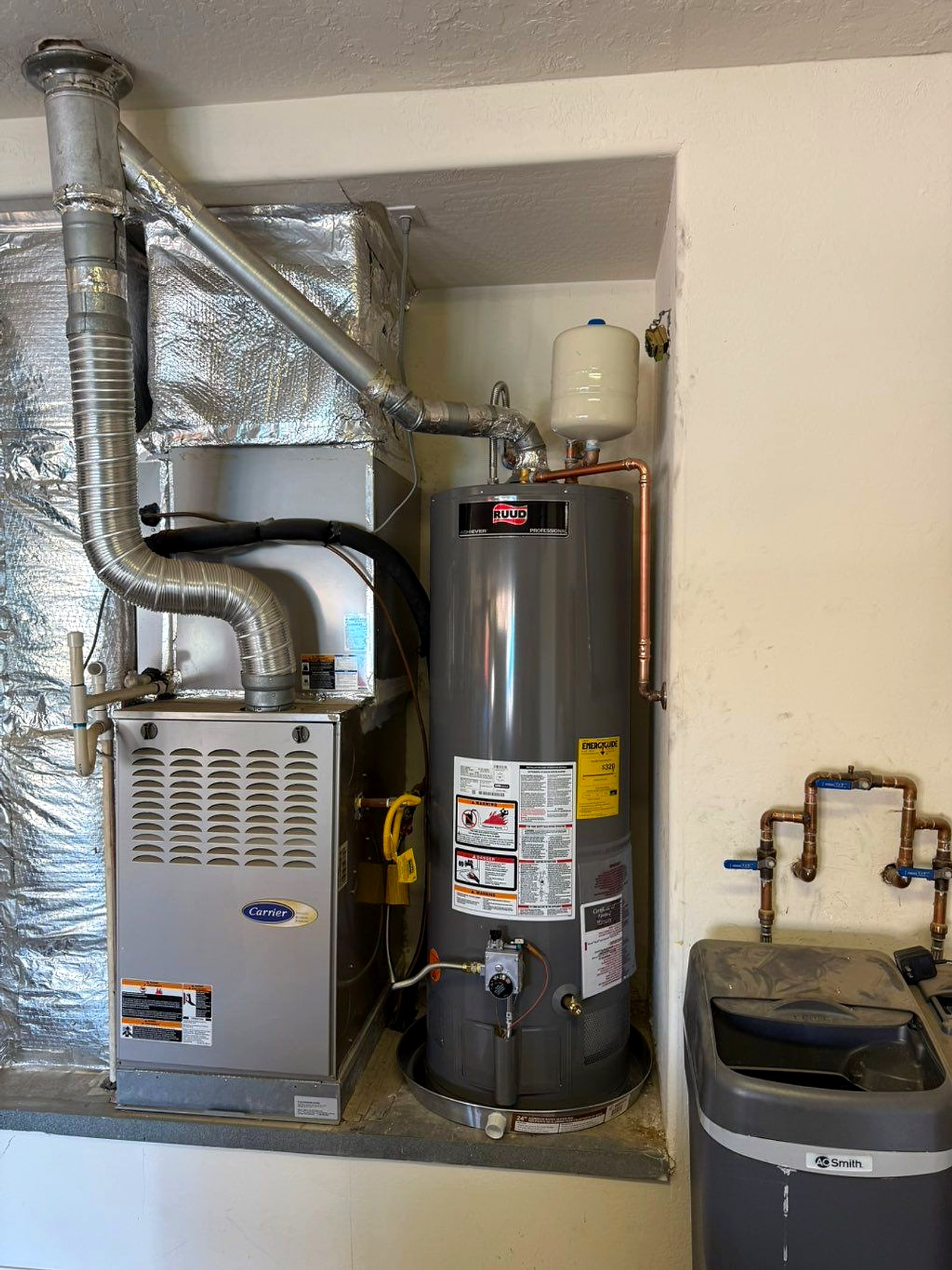 Water heater installed beside a furnace
