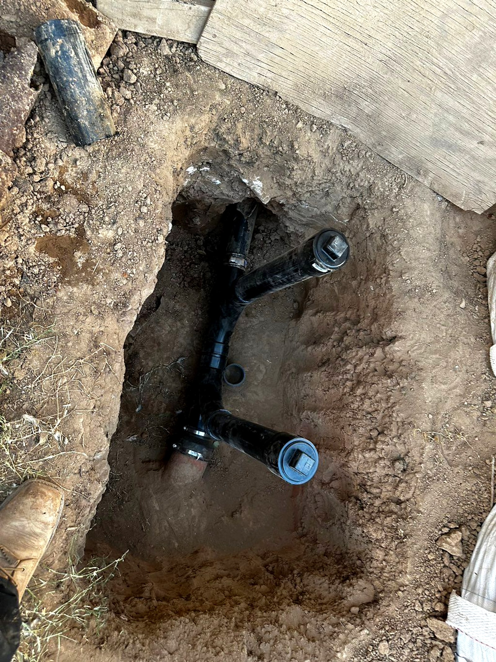 New sewer line laid in an excavated trench